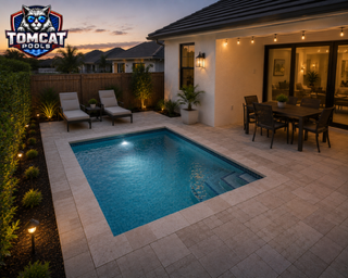 Compact plunge pool for a small backyard by Tomcat Pools